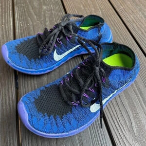 Nike Free RN 3.0 Flyknit  Womens Size
5.5 (636231-014) Blue purple